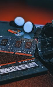 Close-up image of electronic chips and a wristwatch, perfect for tech concepts.